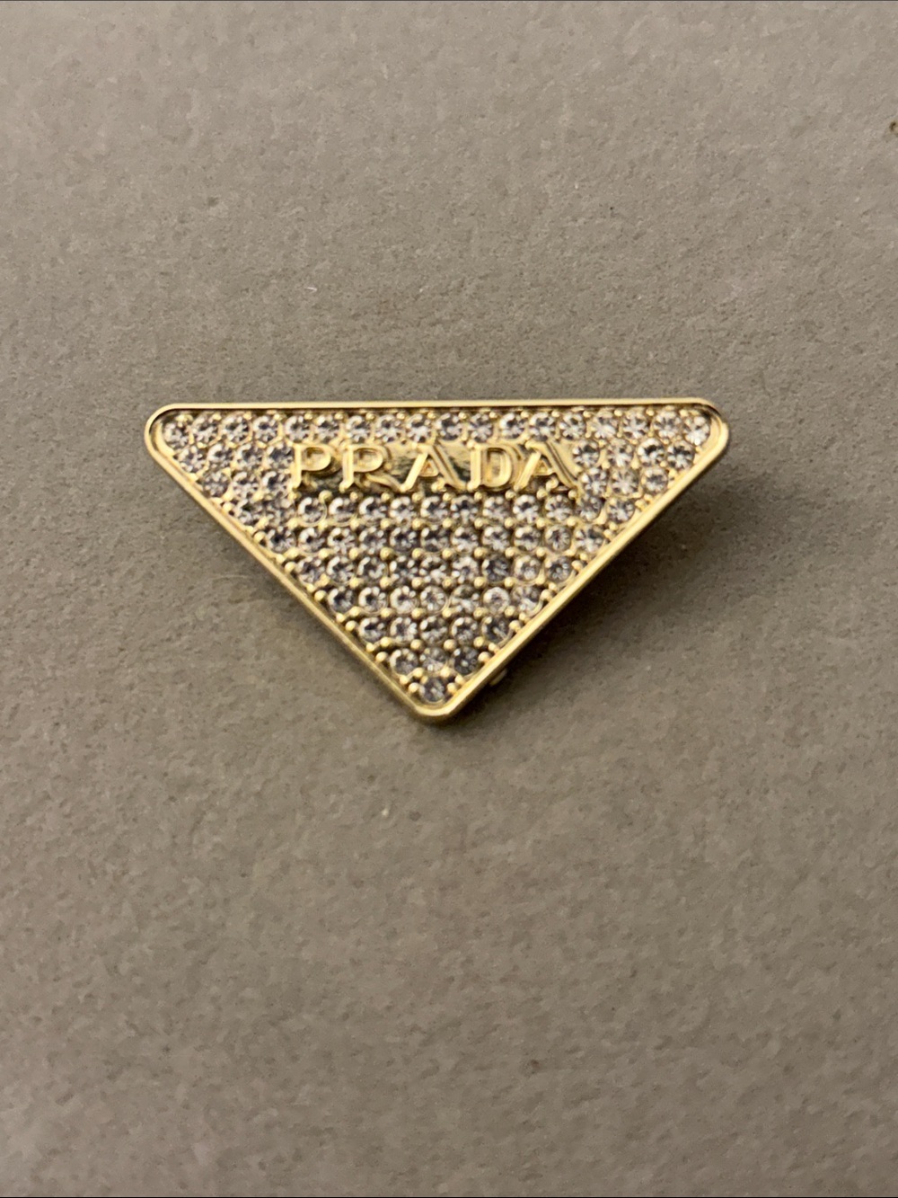 Gold and Crystal Triangle Logo Pin